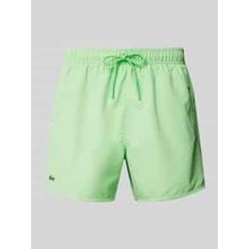 Regular Fit Badeshorts mit Logo-Badge - Lacoste - Modalova