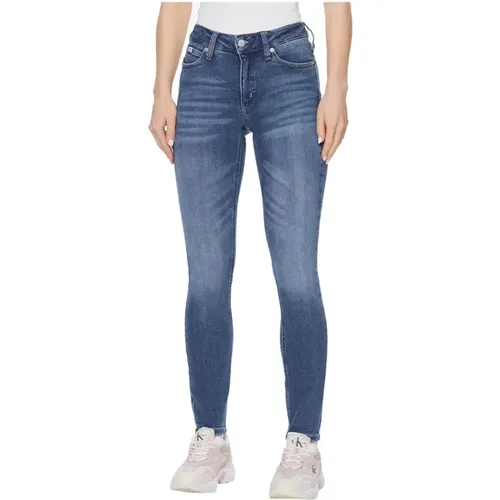 Urban Iconic Blaue Denim Jeans , Damen, Größe: W28 - Calvin Klein - Modalova