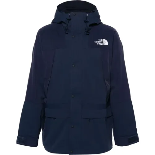 Blaue Ripstop Wasserabweisende Kapuzenmantel , Herren, Größe: M - The North Face - Modalova