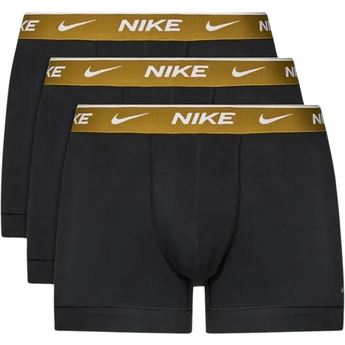 Schwarze Boxershorts mit goldfarbenem elastischem Bund und Logo , Herren, Größe: M - Nike - Modalova