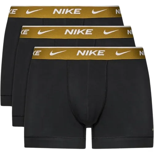 Schwarze Boxershorts mit goldfarbenem elastischem Bund und Logo , Herren, Größe: XL - Nike - Modalova