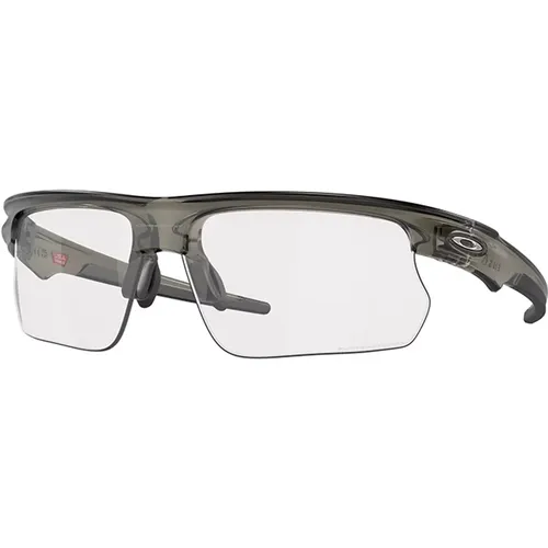 Photochromic Clear To Black Sonnenbrille , unisex, Größe: 68 MM - Oakley - Modalova