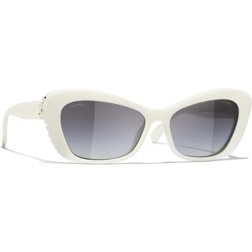 Elegante ovale Sonnenbrille mit weißem Acetatrahmen - Chanel - Modalova