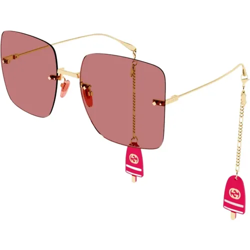 Sonnenbrille mit Vintage-Charme und Kette und Anhängern - Gucci - Modalova