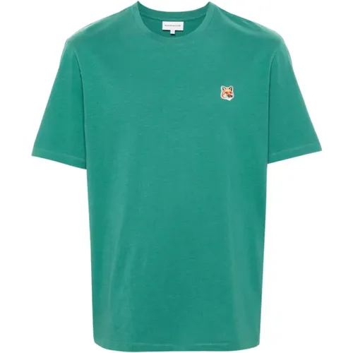 Grüne T-Shirts und Polos,Grüne T-Shirts und Polos mit Fox Head Patch,Grünes T-Shirt mit Fox Head Patch,T-Shirts - Maison Kitsuné - Modalova
