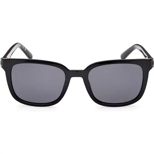 Polarisierte rechteckige Sonnenbrille mit dünnen Bügeln und Rauchgläsern - Guess - Modalova