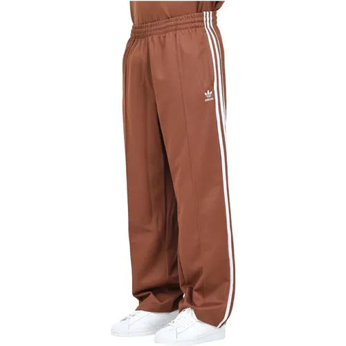 Braune Baggy Fit Firebird Sportliche Hose , Herren, Größe: L - adidas Originals - Modalova