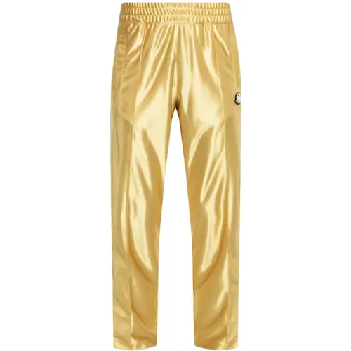 Glänzende gelbe Sweatpants mit Logo-Patch - Moncler - Modalova