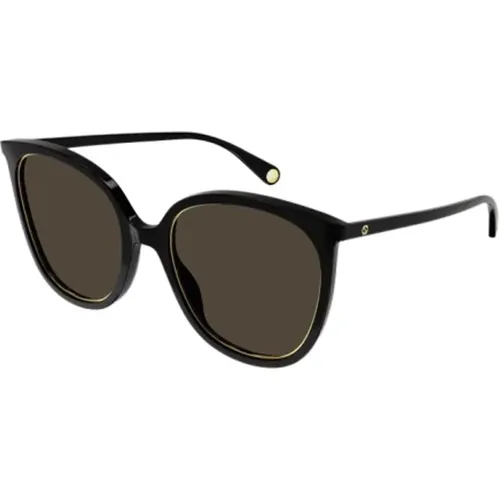 Sonnenbrille mit goldener Fassung - Gucci - Modalova