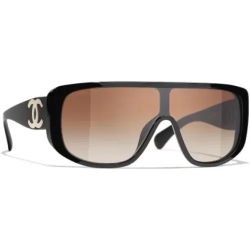 Elegant Sunglasses with Brown Lenses , female, Sizes: 31 MM - Chanel - Modalova