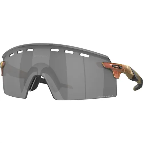 Sportliche Sonnenbrille mit leichten Rahmen und polarisierten Gläsern , Herren, Größe: 39 MM - Oakley - Modalova