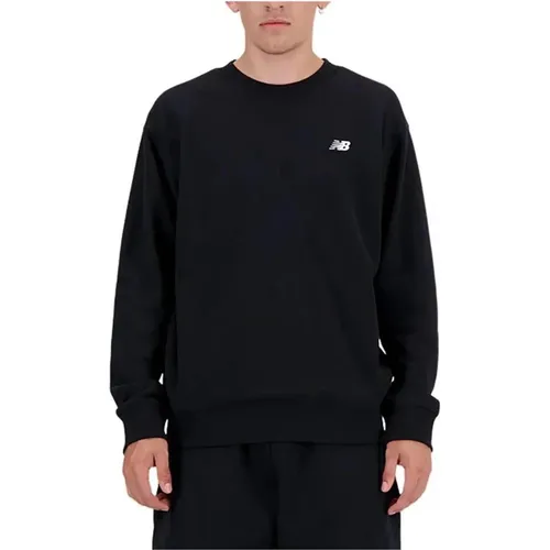 Schwarzer Langarm-Sweatshirt , Herren, Größe: S - New Balance - Modalova