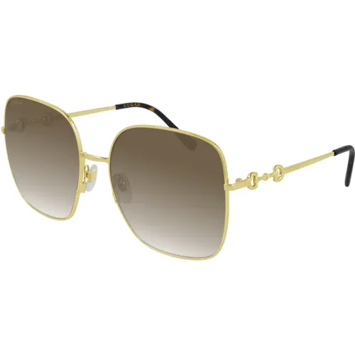 Gold/Braun Sonnenbrille,Gold/Grau getönte Sonnenbrille - Gucci - Modalova
