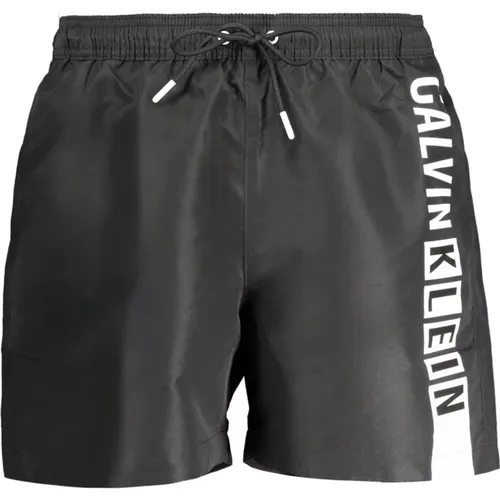 Schwarze Herren Badeboxershorts mit Slip, Taschen, Elastischem Bund, Druck, Logo , Herren, Größe: L - Calvin Klein - Modalova