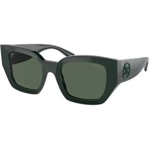 Grüne Sonnenbrille mit dunklen Gläsern - Chanel - Modalova