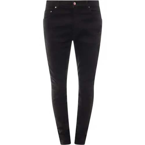 Schwarze Slim Fit Jeans mit Knopfverschluss - Amiri - Modalova