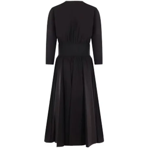 Schwarzes Baumwoll-Popeline-Kleid mit tiefem V-Ausschnitt und langen Ärmeln - Alaïa - Modalova