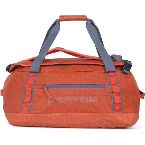 Black Hole Duffel Bags , male, Sizes: ONE SIZE - Patagonia - Modalova