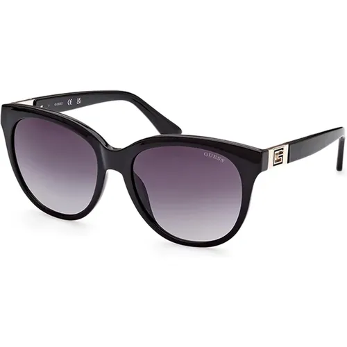 Stilvolle schwarze Sonnenbrille mit grauen Gläsern , Damen, Größe: 56 MM - Guess - Modalova