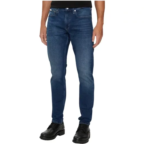 Slim Baumwoll-Stretch-Jeans - Blau Denim , Herren, Größe: W31 L32 - Calvin Klein - Modalova