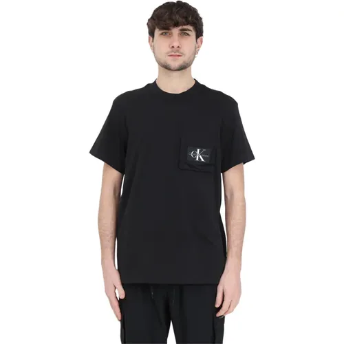 Schwarze T-Shirts und Polos mit weißem Logo - Calvin Klein Jeans - Modalova