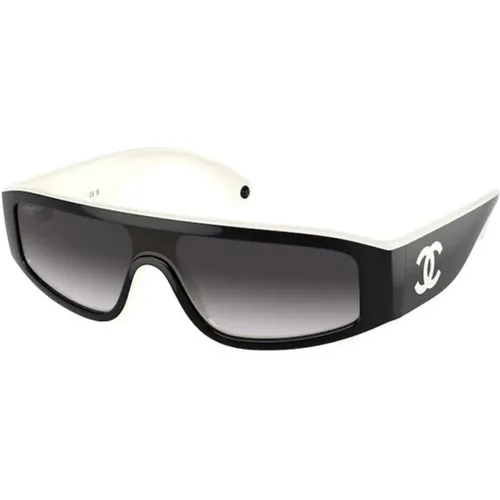 Stylische Sonnenbrille mit schwarzem Rahmen - Chanel - Modalova