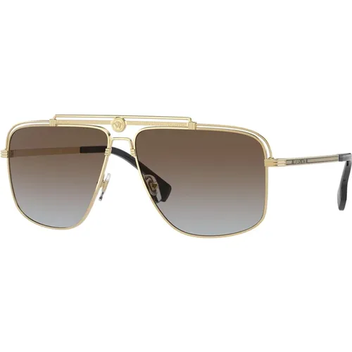 Gold/Braun getönte Sonnenbrille - Versace - Modalova