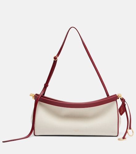 Le Click Medium canvas shoulder bag - Alaia - Modalova