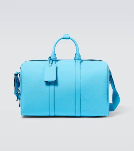 Gucci GG debossed PVC duffel bag - Gucci - Modalova
