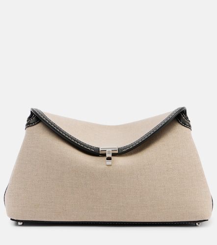 Clutch T-Lock de lona con piel - Toteme - Modalova