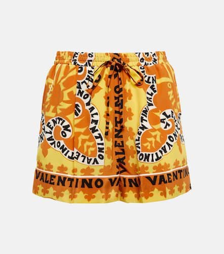 Shorts in crêpe di seta con stampa - Valentino - Modalova