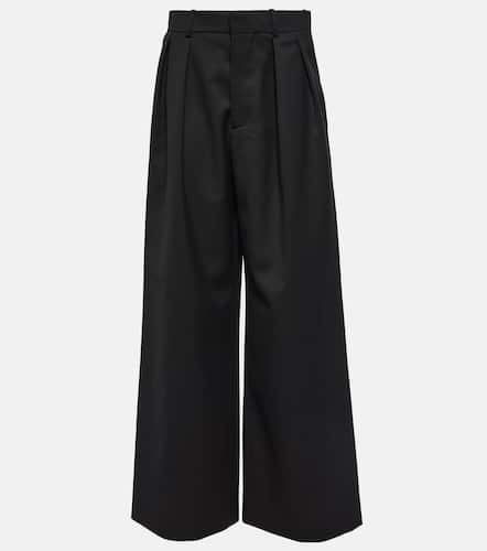 Pantalones anchos de lana virgen con tiro bajo - Wardrobe.NYC - Modalova