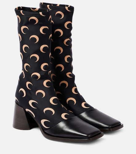 Printed leather-trimmed sock boots - Marine Serre - Modalova
