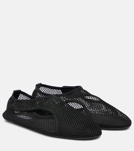 Alaia Fishnet slip-on shoes - Alaia - Modalova