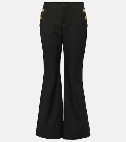 Pantalones flared de lana virgen - Balmain - Modalova