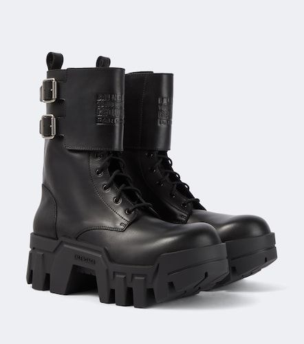 Bulldozer debossed leather combat boots - Balenciaga - Modalova