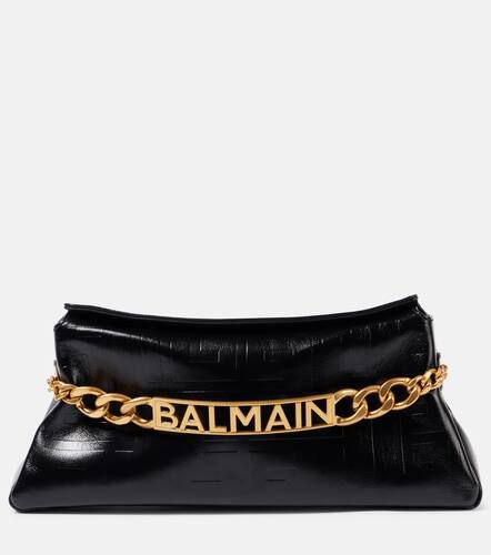 PB embossed leather clutch - Balmain - Modalova