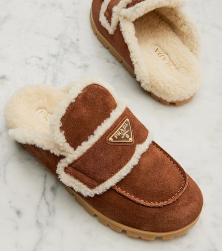 Prada Shearling-lined suede mules - Prada - Modalova