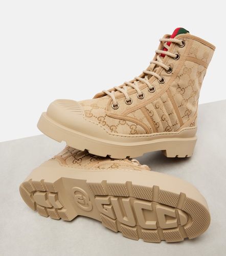 Gucci GG Canvas combat boots - Gucci - Modalova