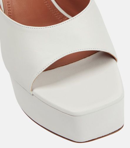 Dalida leather platform mules - Amina Muaddi - Modalova