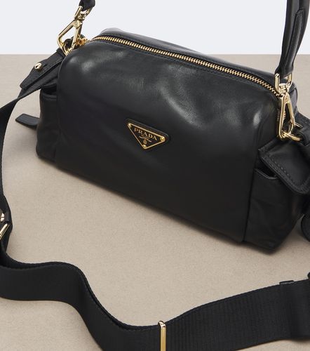 Explore Small leather shoulder bag - Prada - Modalova