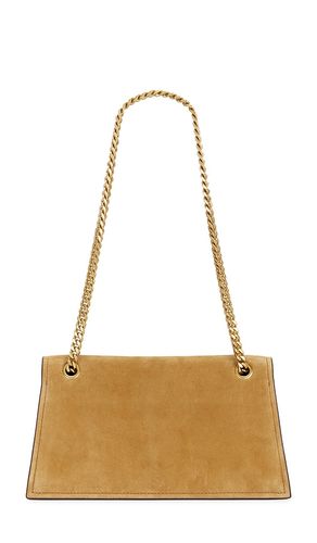 Kira Turnlock Suede Shoulder Bag in - Tory Burch - Modalova