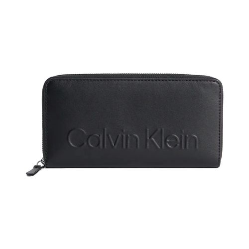 Portafoglio Zippe logo relief - Calvin Klein Jeans - Modalova