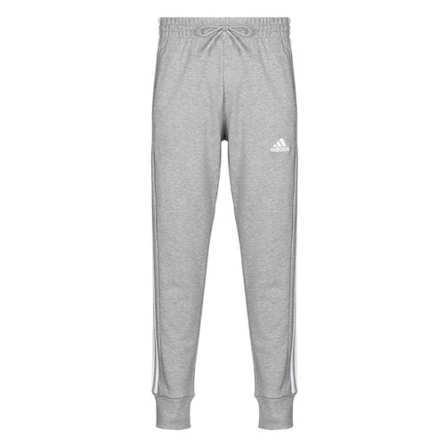 Pantaloni Sportivi Essentials French Terry Tapered Cuff 3-Stripes Joggers - Adidas - Modalova