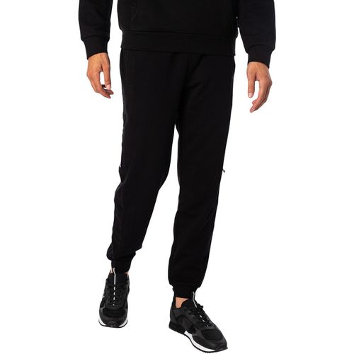 Pantaloni Sportivi Joggers laterali di marca - Emporio Armani EA7 - Modalova