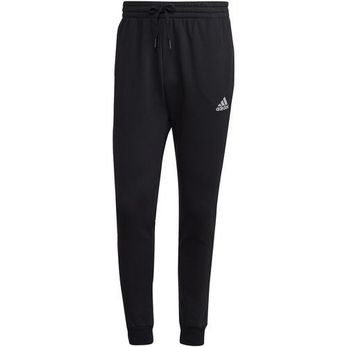 Pantaloni Essentials Fleece Regular Tapered - Adidas - Modalova