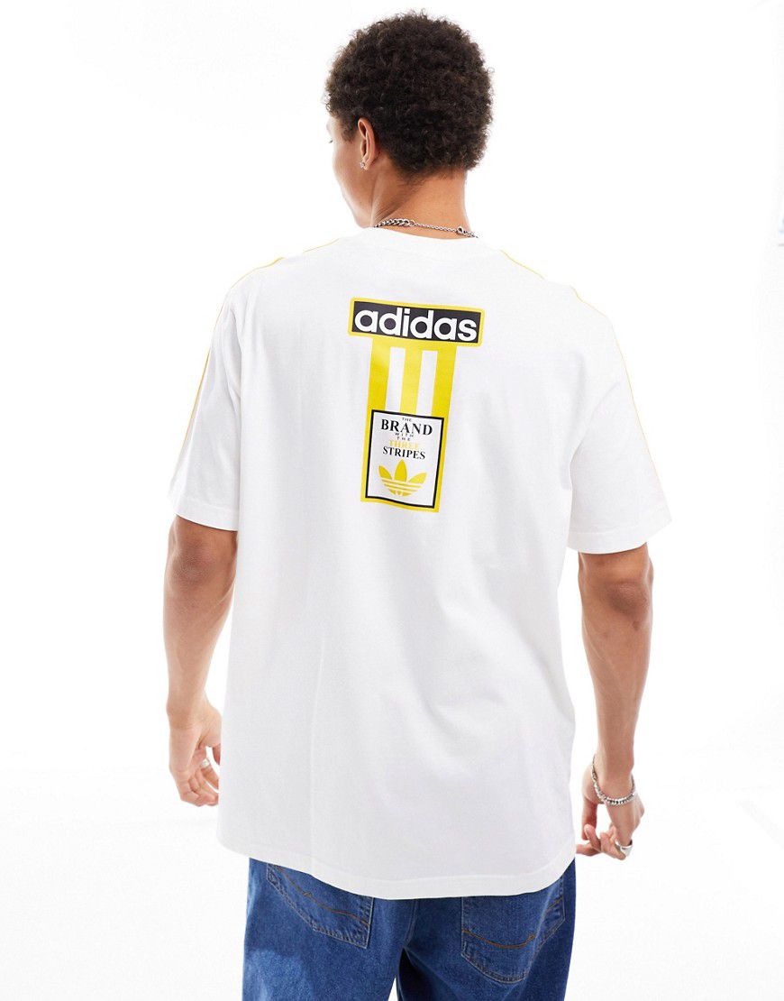 T-shirt bianca e gialla con logo - adidas Originals - Modalova