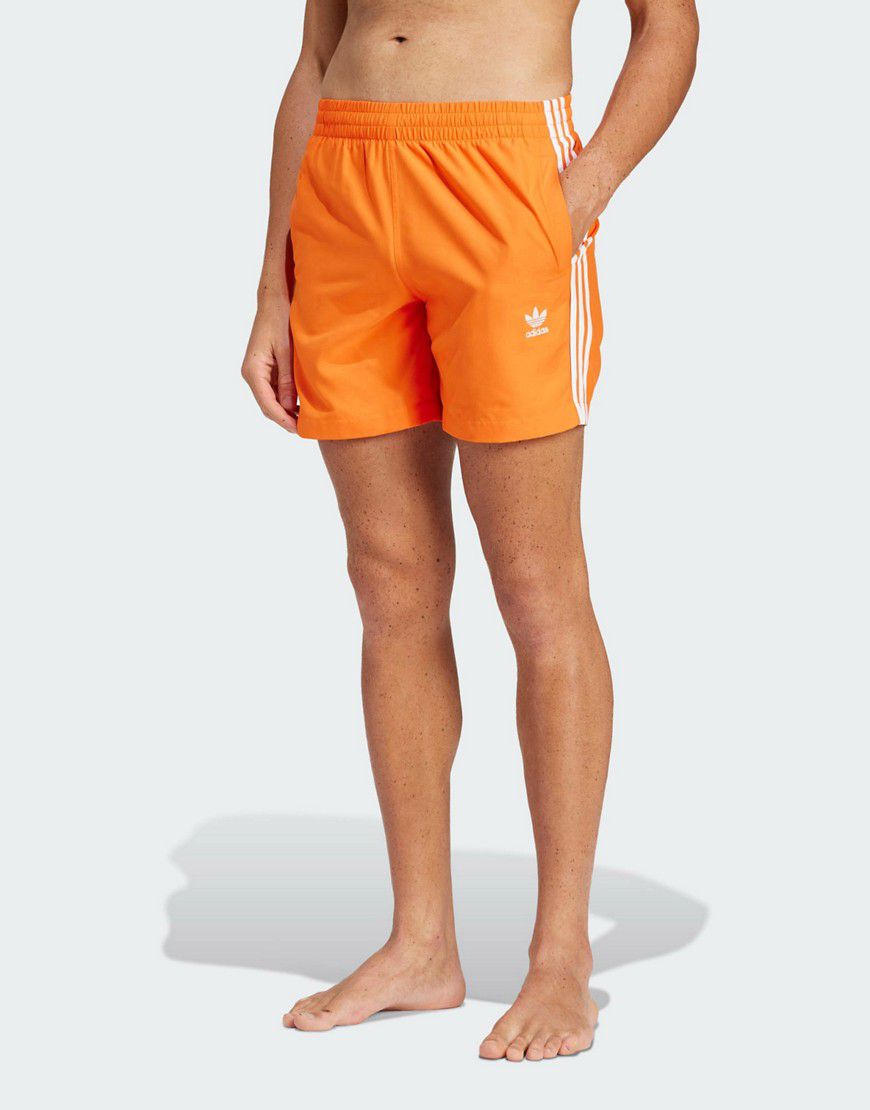 Adicolor - Pantaloncini da bagno arancioni con 3 strisce - adidas Originals - Modalova
