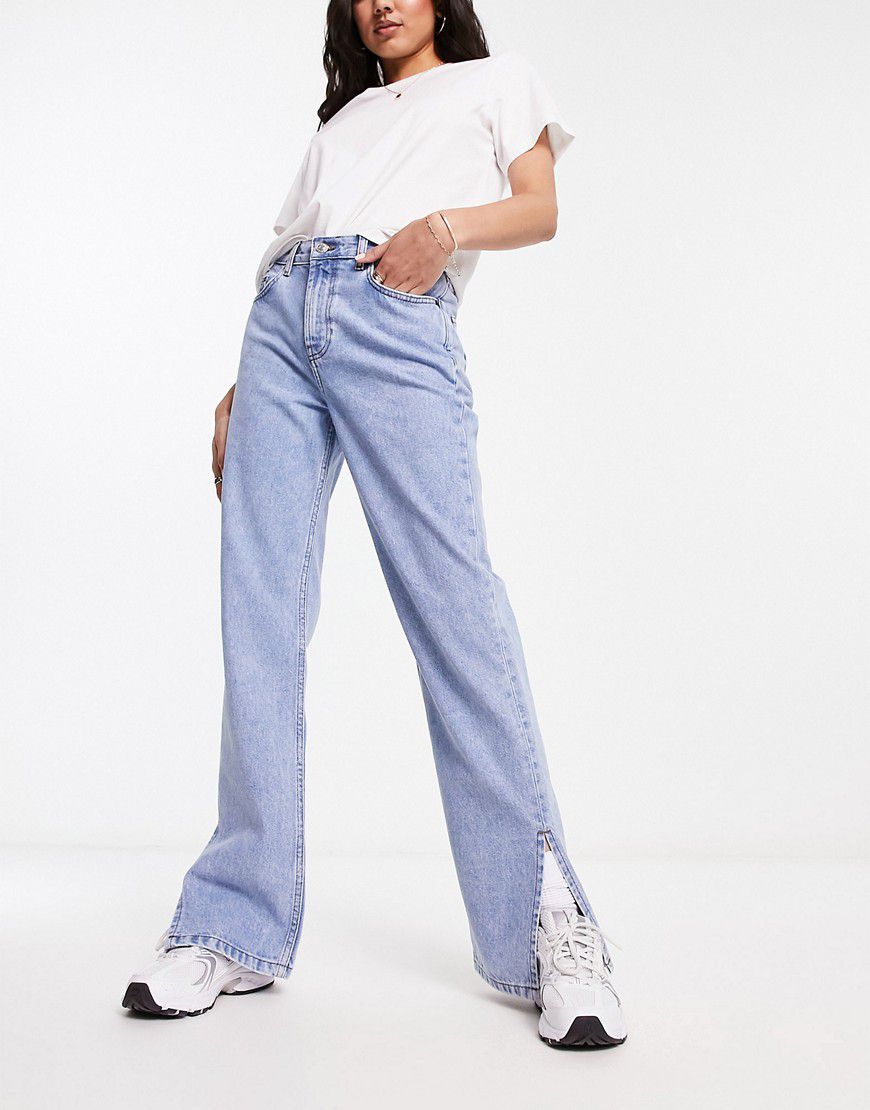 Jeans dritti anni '90 lavaggio chiaro con spacco sul fondo - ASOS DESIGN - Modalova