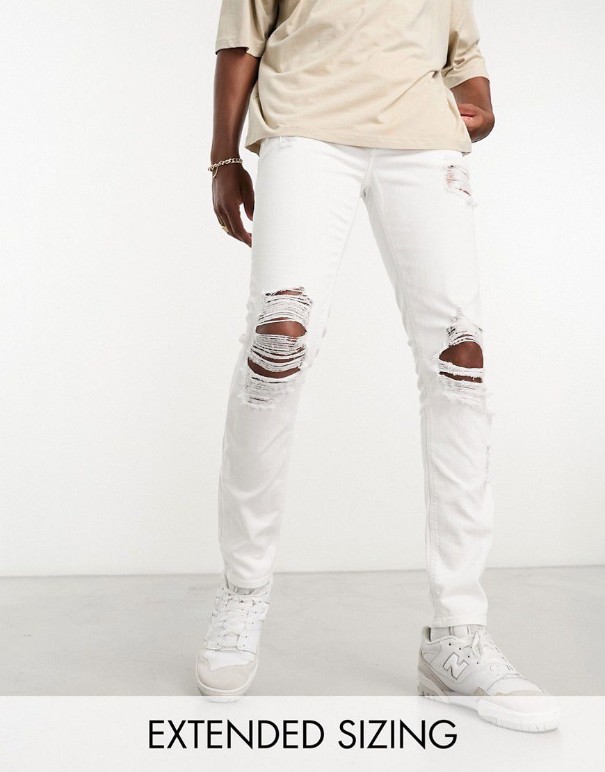 Jeans skinny strappati bianchi - ASOS DESIGN - Modalova
